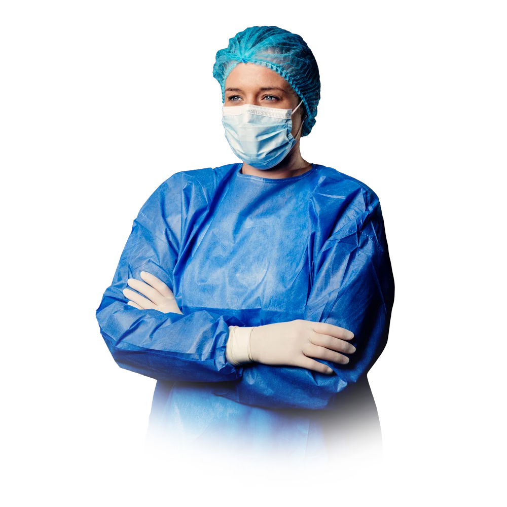 Maske, bone ve medikal önlük giyen sağlık çalışanı